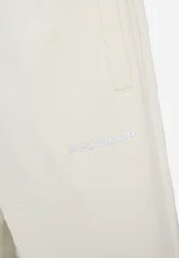 LOGO WIDE PANTS - Tracksuit bottoms - washed unbleached white gum
