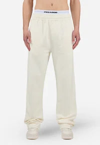 LOGO WIDE PANTS - Tracksuit bottoms - washed unbleached white gum
